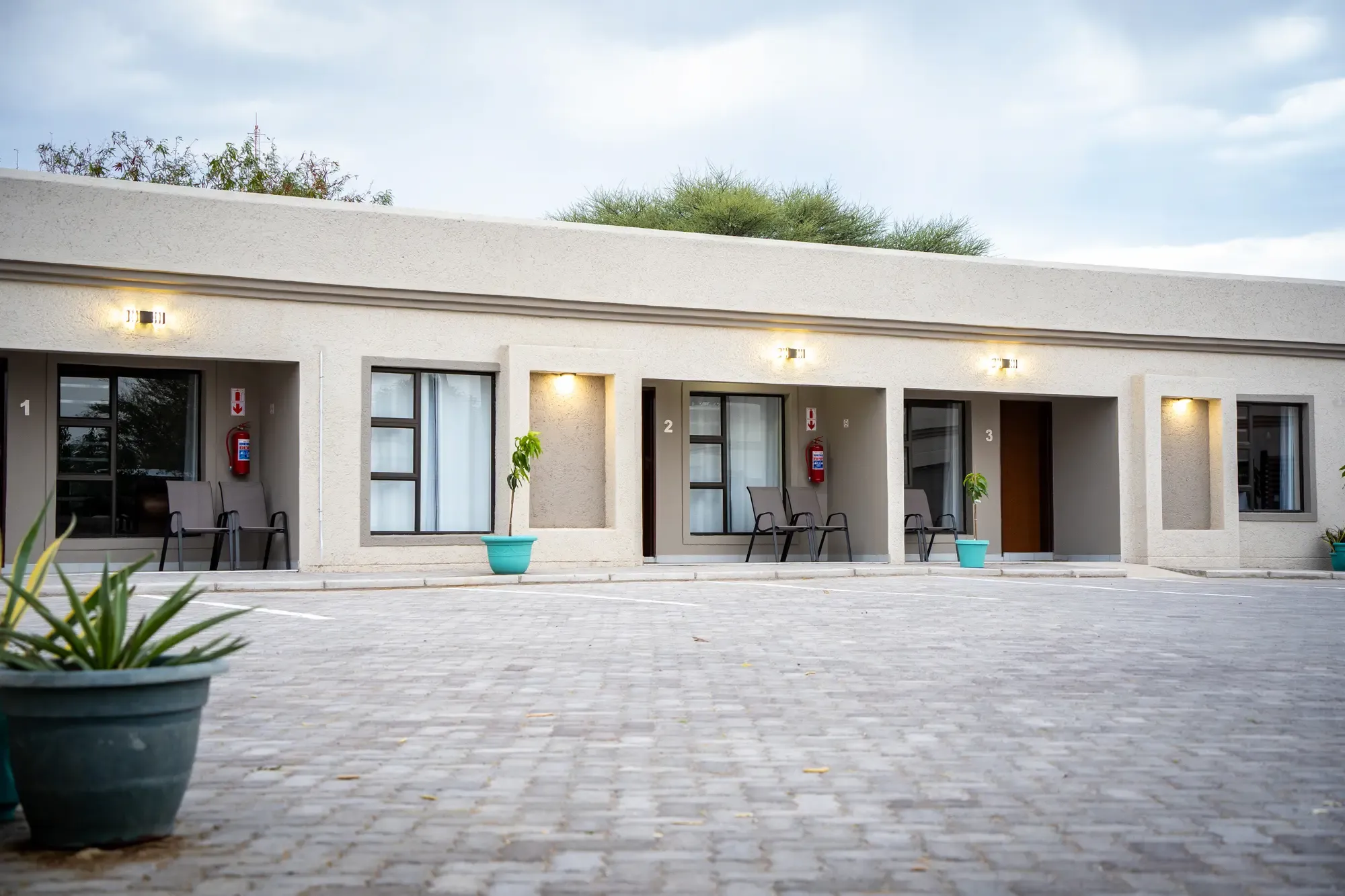 Mango Self-catering Apartments exterior at golden hour